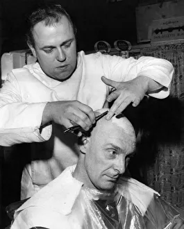 00063 Prints: Hair dressers: Barbers: Fred Threlfall has a lather and shave after his hair is cropped