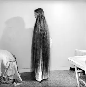 Hair styles: Long hair: Mrs. Mabel Anderson seen here with her floor length hair