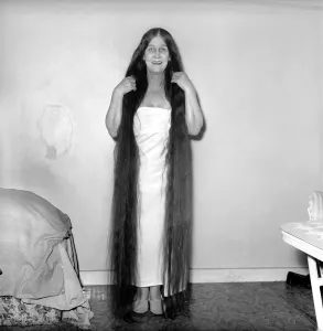 Hair styles: Long hair: Mrs. Mabel Anderson seen here with her floor length hair