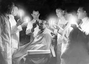 Hairdressers Prints: Haircutting under difficult circumstances in the Newcastle store of Bainbridge & Co