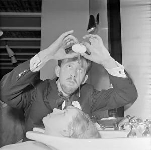 Eggs Prints: Hairdresser George Frances giving an egg shampoo Alternative Beauty Treatments