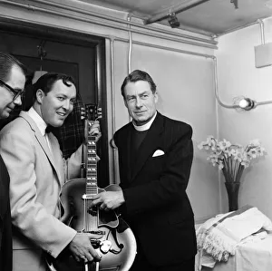 Bill Haley on his first visit to England seen here with the Bishop of Woolwich Rt Rev
