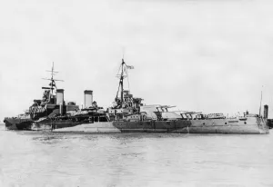 Half broadside view from the stern of the 8000 ton Royal Navy Mauritius class cruiser HMS