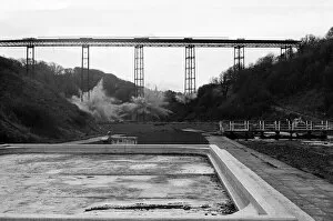 01366 Collection: The Half Penny Bridge, Saltburn, North Yorkshire, being blown up. 17th December 1974