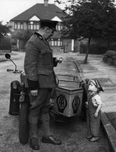 Two and half year old David Leigh looks up to a Control Officers Brian Wells