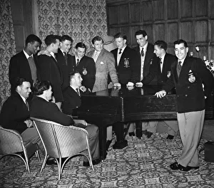 Halifax players seen here gathering the piano after enjoying a meal on the eve of