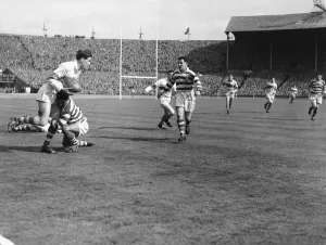 00352 Prints: Halifax try to stem a St Helens attack during the Rugby League Cup Final at Wembley