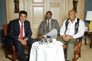 Hall of fame boxers (from left to right) Joe Frazier George Foreman