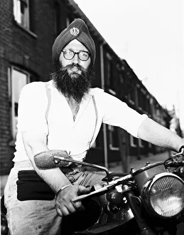 Turban Prints: Hans Powles was arrested again for not wearing a motorcycle helmet when riding his bike
