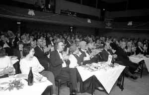00101 Prints: The happy audience show their enjoyment with applause during a performance by scouts