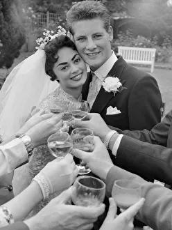 The happy couple Pamela and David Moore receive the toast at their reception