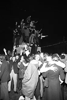 00445 Prints: A happy crowd of young people greet the New Year in high-spirits in Broadgate, Coventry