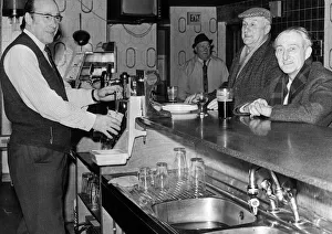 Happy customers at the Copper Top drink a toast to being named a super pub of