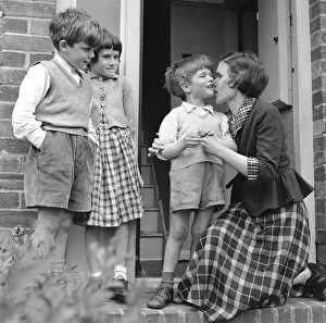 The happy faces of three little children - faces that their parents James