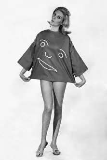 00030 Prints: This Happy Face'shirt is the talk of the beaches. In brick red sailcloth