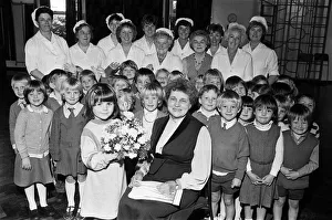 Cook Prints: Happy retirement Grandma... kitchen supervisor Mrs Joan Booth says farewell to colleagues