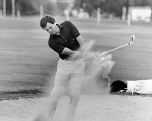 Happy as a sand boy... Bernard Gallacher blasts from a bunker in the Lawrence Batley