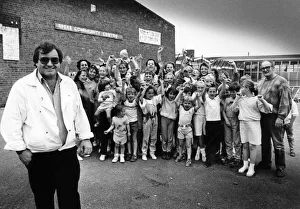 Youth Clubs Prints: Happy youngsters at Speke Community Centre celebrate on hearing the news that the centre
