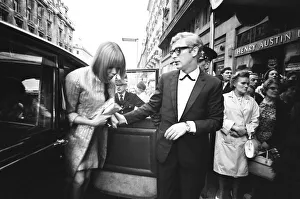 Harlow film premiere. Michael Caine arrives with Lucianna Paluzzi