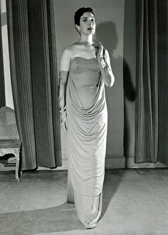 Elegant Prints: Harnell fashions 1950s - August 1955 Artemus - An Empire line dress in slate blue