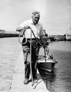 Casual Clothing Prints: Harold Wilson MP on holiday in the Scilly Islands 1963 ties up his boat