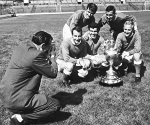 Harry Catterick manager of Everton football Club filming some of his players with