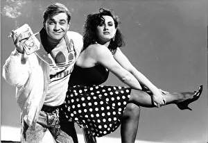 Comedians Prints: Harry Enfield as character Loadsamoney with his video girlfriend plasterer Fiona Riley
