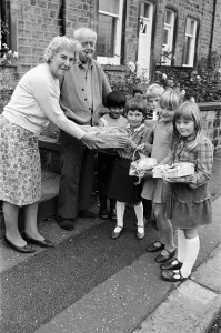 Harvest surprise... pensioner Mrs Edith Gill and Mr Clifford Sheard receive harvest