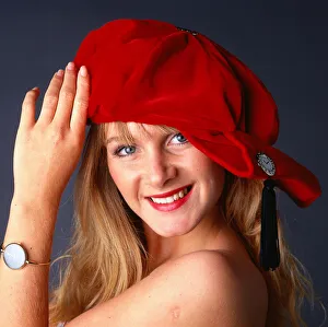 Beret Prints: Hat Fashion Model wears red velvet hat November 1989