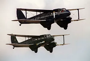 Air Display Prints: The De Havilland D. H. 89a Dragon Rapide was first flown from Stag Lane by Hubert Broad