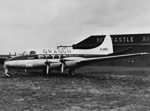 00352 Prints: A de Havilland Heron propeller-driven small airliner operated by Dragon Airways
