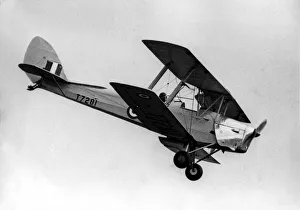 Aerobatics Prints: A de Havilland Tiger Moth biplane during its display at the Sunderland Airshow