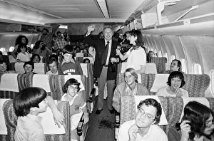 00350 Prints: Head of Laker Airways Freddie Laker mingles with passengers on board his translatlantic