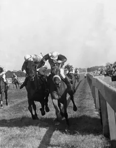 Jockeys Prints: Only a head separated Inner Circle ridden by W Smith, the winner