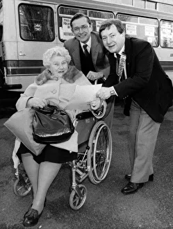 Wheelchair Prints: Health Secretary Norman Fowler (centre) sees off Mrs Eva Barnes at the start of a