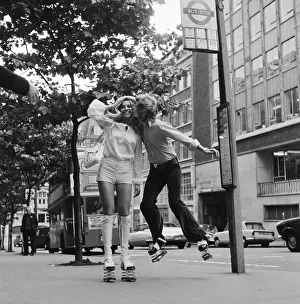 Bouncing Prints: Heather Beckers and Nigel Lythgoe of the Young Generation dance troupe trying out a pair