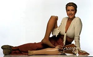 Heather Mills Model who had her leg Amputaterd holding false leg Dbase