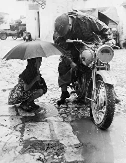 Motor Cycle Prints: Heavy rains have added to the difficulties facing the 5th and 8th armies in Italy