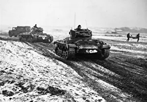 Warfare Prints: Heavy tanks going in action to mimic a battle arranged for the benefit of munition