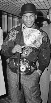 Images Dated 18th March 1987: Heavy weight boxing champion of the World Mike Tyson seen here arriving at London