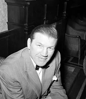 Former Heavywieght champion Tommy Farr at a training session for Don Cockell in a gym