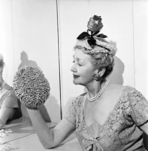 Headwear Prints: Hedda Hopper who is going to present to the Queen two of her fantastic hats