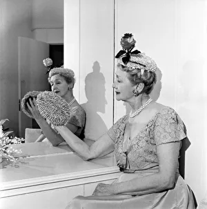 Headwear Prints: Hedda Hopper who is going to present to the Queen two of her fantastic hats
