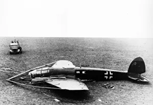 01444 Prints: Heinkel He 111 Mk V, fitted with barrage balloon cutting device brought down on moorland