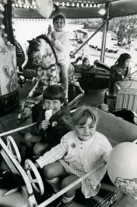 00066 Prints: Helen Graham (rear), David Goodwin and Fiona Graham on one of the rides at the Tyneside