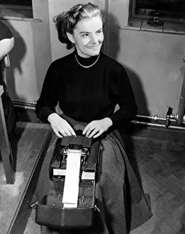 Secretary Prints: Helen Holme, April 1953 Office worker operating a Palantype machine Student