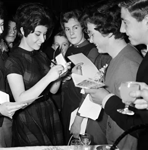 Award Prints: Helen Shapiro signing autographs for newsboys and girls at the Daily Mirror