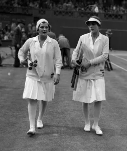 Racket Prints: Helen Wills walks out on to the court at the Wimbledon tennis championships with her