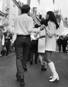 The Helston Furry Dance (Cornwall) to dancers in each of the various dances skipped about