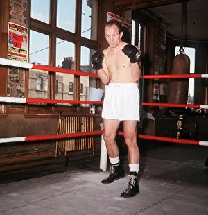 Henry Cooper boxer in his gym. April 1966